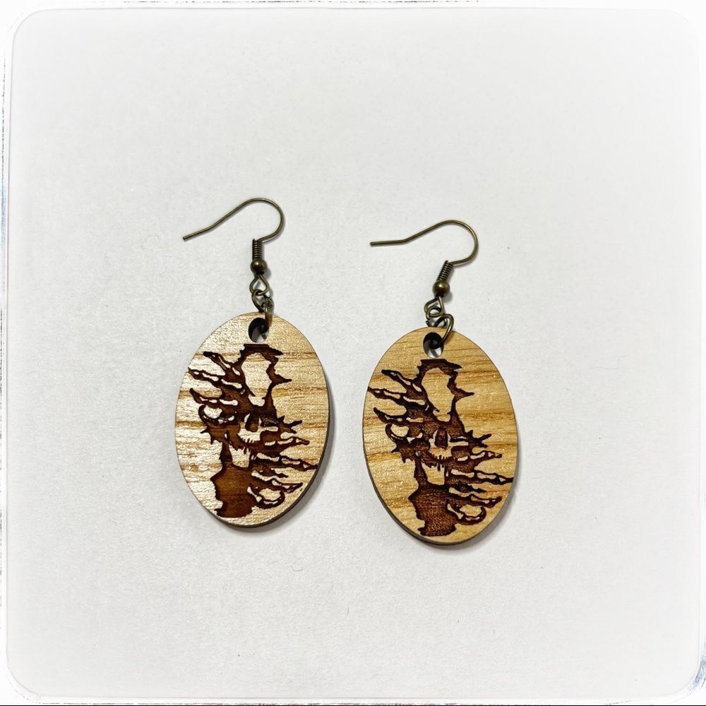 Skeleton wood engraved earrings